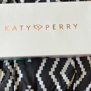 Katy perry gold metallic flats.